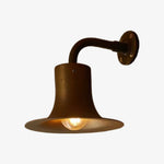 Charger l'image dans la visionneuse de galerie, Antique brass wall sconce with warm bulb glow