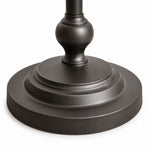 Load image into Gallery viewer, Close-up of the layered round base on the black metal floor lamp
