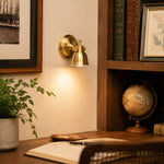 Cargar imagen en el visor de la Galería, Brass wall lamp installed in a warm interior