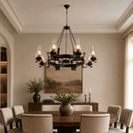 Charger l'image dans la visionneuse de galerie, Eight-light wagon wheel chandelier above a large round dining table