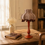 Load image into Gallery viewer, Vintage striped wood table lamp styled on a side table