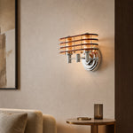 Charger l'image dans la visionneuse de galerie, Bauhaus amber LED wall sconce casting warm light in a lounge