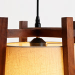 Cargar imagen en el visor de la Galería, Close-up of walnut finish top frame and black cord