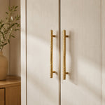 Bild in Gallery-Viewer laden, Natural Brass hammered bar pulls installed on wardrobe doors