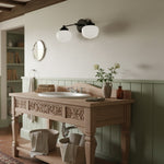 Bild in Gallery-Viewer laden, Opalume Metal Canopy Globe Vanity Sconce — Übergangs-Art-Deco-Wandleuchte