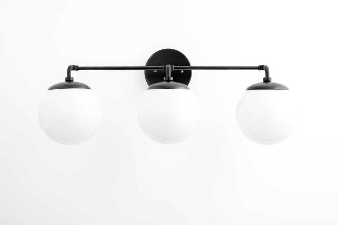 Aplique de pared de vidrio Glorica: lámpara de tocador vintage moderna