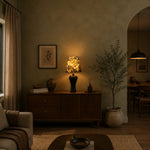Load image into Gallery viewer, Black floral table lamp styled in living room