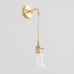 Bild in Gallery-Viewer laden, Clear glass wall light with brass arm, EW shade 13 cm high and 12 cm diameter