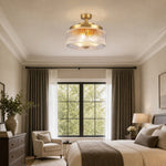Load image into Gallery viewer, Brass ribbed glass flush mount ceiling lamp in a bedroom