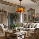 Cargar imagen en el visor de la Galería, Amber glass pendant chandelier lit in a living room
