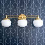 Bild in Gallery-Viewer laden, Opalume Metal Canopy Globe Vanity Sconce — Übergangs-Art-Deco-Wandleuchte