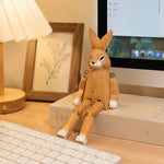 Cargar imagen en el visor de la Galería, Hand-carved wooden rabbit ornament styled on a tabletop edge