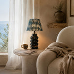 Load image into Gallery viewer, Sculptural ceramic table lamp in a relaxed seating area