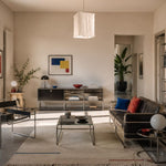 Load image into Gallery viewer, Sculptural linen pendant light installed in a modern living room