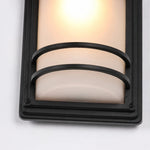 Cargar imagen en el visor de la Galería, Close-up of glowing glass shade and black protective bars