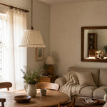 Load image into Gallery viewer, Pleated fabric pendant light in a warm living and dining room scene