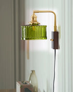 Bild in Gallery-Viewer laden, Fish-Scale Glass and Brass Plug-In Wall Lamp in an alternate room scene with changed background