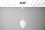 Load image into Gallery viewer, Tierlux Glass Tiered Skyscraper Shade Pendant – Art Deco Ceiling Light for Kitchen Island