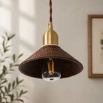 Bild in Gallery-Viewer laden, Black walnut carved pendant shade shown in a bright interior
