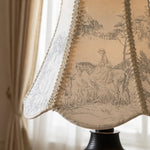 Charger l'image dans la visionneuse de galerie, Printed fabric shade detail in warm ambient setting