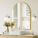 Cargar imagen en el visor de la Galería, Chrome wall sconces framing a bright arched vanity mirror