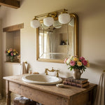 Bild in Gallery-Viewer laden, Opalume Metal Canopy Globe Vanity Sconce — Übergangs-Art-Deco-Wandleuchte