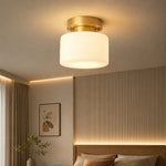 Cargar imagen en el visor de la Galería, Warm flush mount ceiling light above a bedroom corner