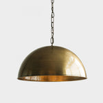 Bild in Gallery-Viewer laden, Antique brass dome pendant light on a clean white background