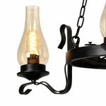 Charger l'image dans la visionneuse de galerie, Close-up of clear hurricane glass shade and curved black iron arm