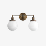 Charger l'image dans la visionneuse de galerie, Applique murale géométrique linéaire Lumio Globe – Luminaire moderne pour salle de bain, idéal pour les zones miroir et lavabo