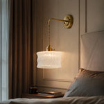 Charger l'image dans la visionneuse de galerie, Clear ripple glass wall sconce mounted beside a bed
