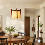 Cargar imagen en el visor de la Galería, Single walnut fabric pendant light above a dining table