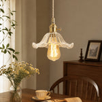 Cargar imagen en el visor de la Galería, Style N flower-edged clear glass pendant above a dining table