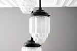 Load image into Gallery viewer, Tierlux Glass Tiered Skyscraper Shade Pendant – Art Deco Ceiling Light for Kitchen Island