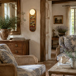 Cargar imagen en el visor de la Galería, Vintage fabric wall sconce in a warm living room