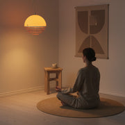 Transform ordinary corners of your home into tranquil healing spaces dedicated to yoga and meditation, bathed in the warm glow of sunset pendant lighting.
