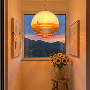 Bauhaus sunset pendant light in a minimalist golden hour living room