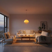 2026 emotional lighting trend featuring a Bauhaus sunset pendant light in a Scandinavian living room.
