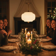 Festive dining room table set for a party with the Eloise vintage milk glass pendant light hanging above.