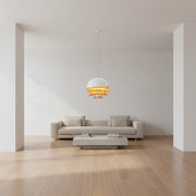 Minimalist living room featuring the Sunset Pendant Light as the central focal point.