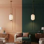 Split image showing the Eloise Pendant Lamp styled in both Peach Fuzz and Deep Green rooms.