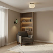 Layered lighting in a cozy small apartment living area