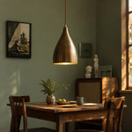 Load image into Gallery viewer, Aged brass pendant light in a green dining room