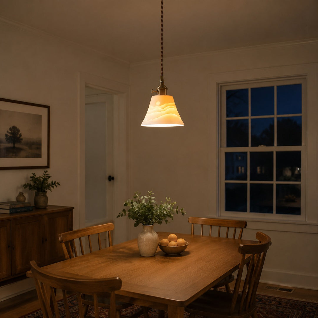 Warm evening dining room with ceramic pendant light