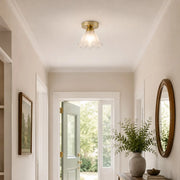 Petal glass ceiling light in a bright entryway