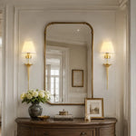 Load image into Gallery viewer, Brass fabric shade wall sconce styled in an entryway
