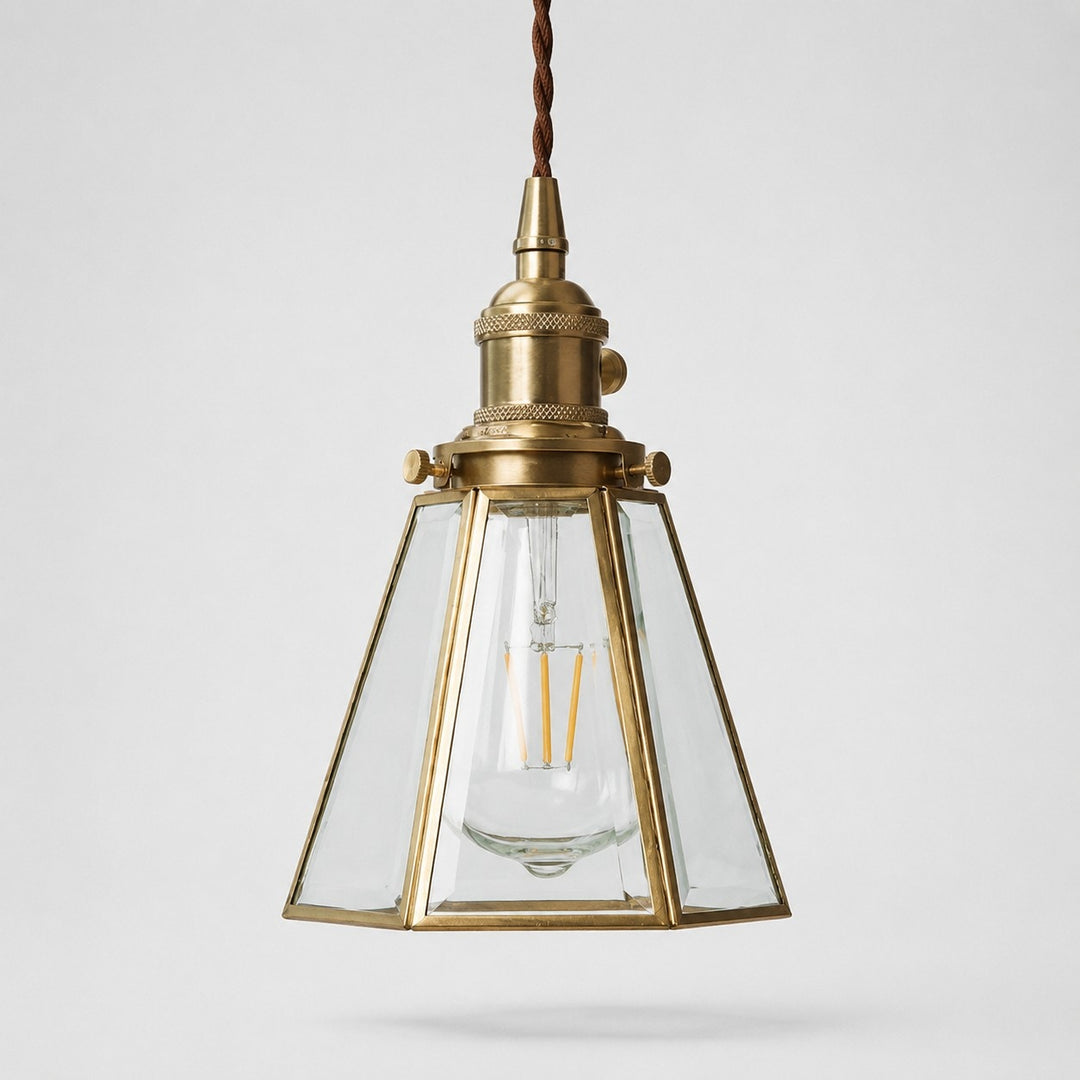 Clear glass pendant light with brass canopy