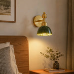 Bild in Gallery-Viewer laden, Green stone wall light installed beside a bed