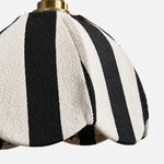 Charger l'image dans la visionneuse de galerie, Close-up of black and ivory striped textured fabric shade with scalloped petal shape