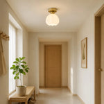 Load image into Gallery viewer, Milk glass flower ceiling light in a hallway